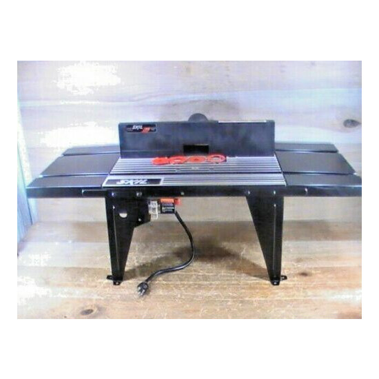 Pre-owned SKIL #RAS450 34"x 13"x 11" Router Table W/ Extensions / Fence & Switch image {1}
