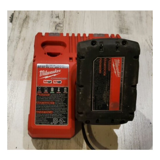 MILWAUKEE M18 18-Volt Lithium-Ion Battery Pack And Charger Free Shipping  image {1}